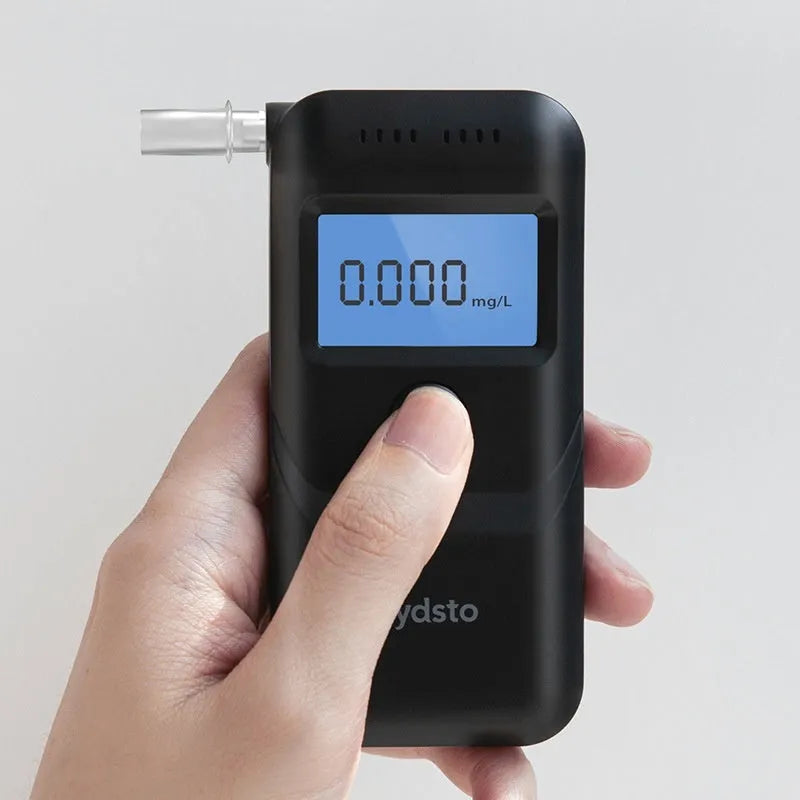 Black HD-JJCSY01 personal alcohol breath tester on a white background.