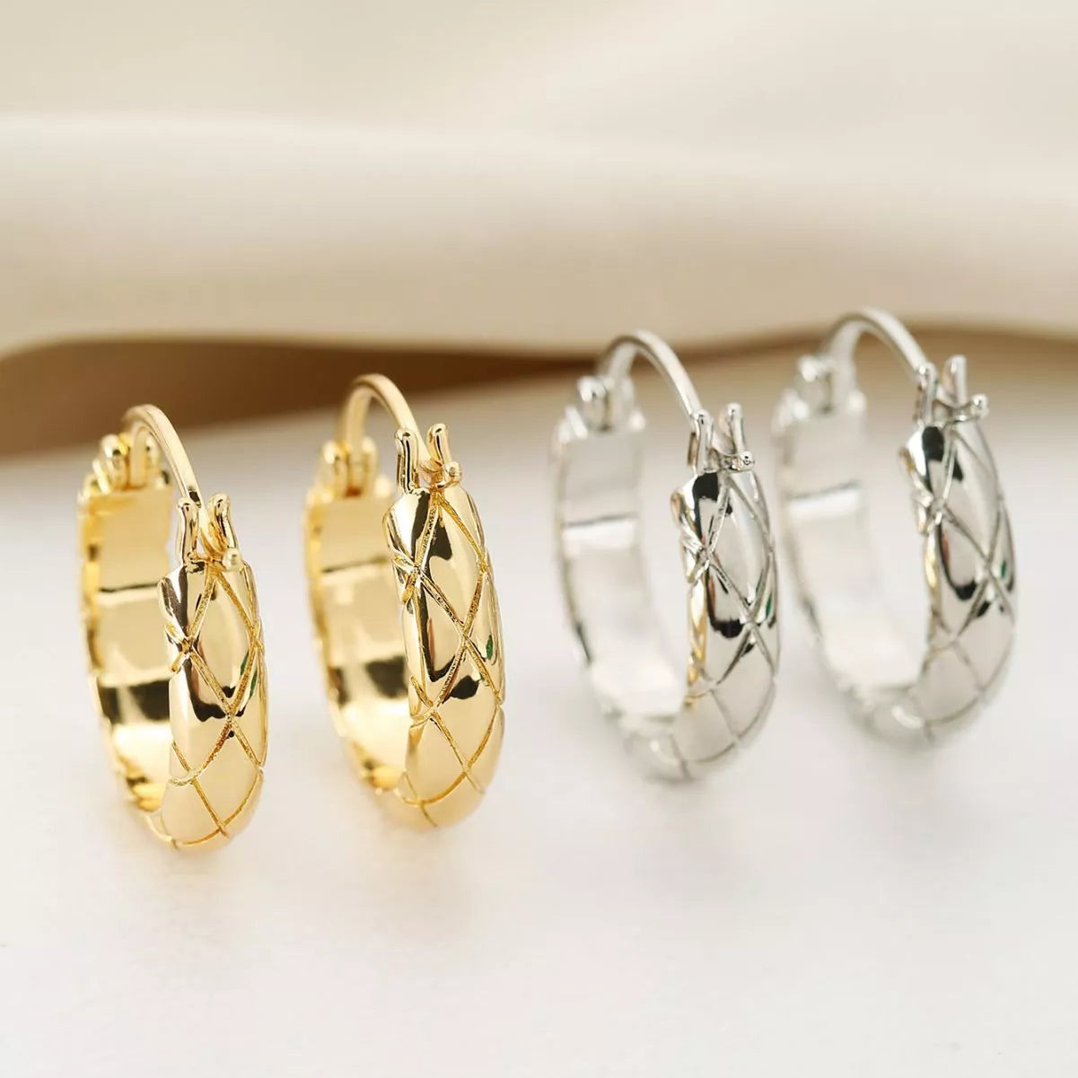 Diamond plaid earrings in golden yellow and silver, crafted from durable copper with a glossy finish.