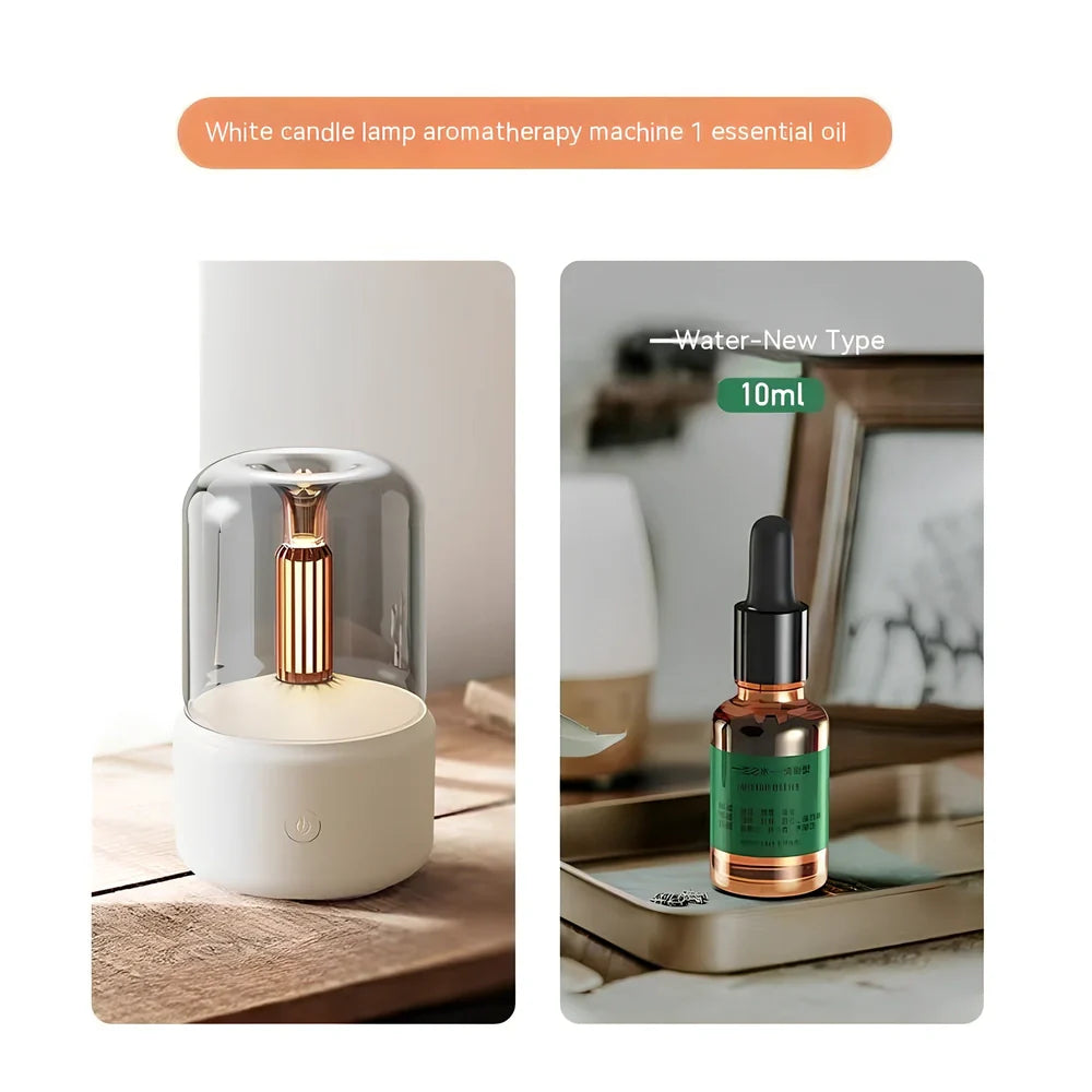 Compact black aroma diffuser humidifier with remote control on wooden surface