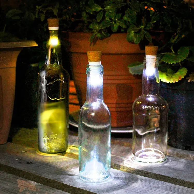 LED rechargeable luminous bottle cap cork light showing 15 LED beads and plastic shell measuring 30mm by 73mm