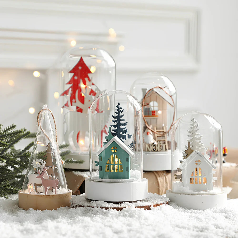 Small 15 cm glass reindeer night lamp in white snowman cabin style casting 100 lumen festive glow on table