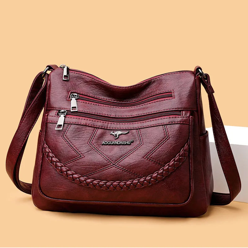 Soft leather fashion shoulder bag in horizontal square design with multiple internal pockets