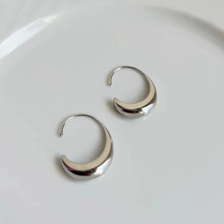 Gold and silver retro fashion earrings with snake design elements and electroplated finish