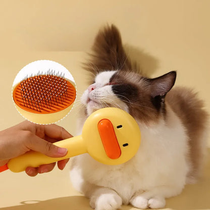Small yellow duck-shaped pet grooming comb with needle pins and open section design