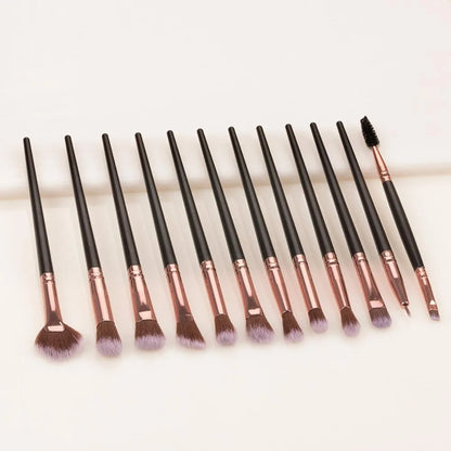 Seven-piece eyeshadow brush set with rayon bristles, PU heads, and 14cm long plastic rod handles in brown or black