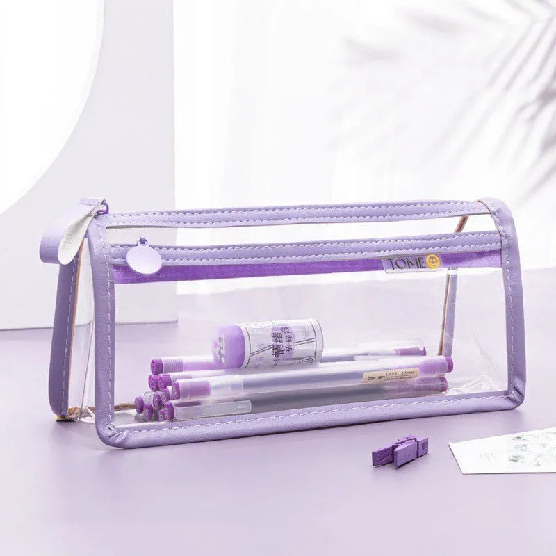Transparent double-layer pencil case in blue showing organised stationery inside compartments