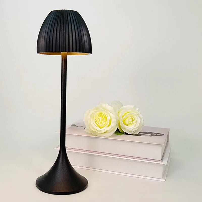 USB rechargeable night lamp with dimming pattern display in black thin round base design