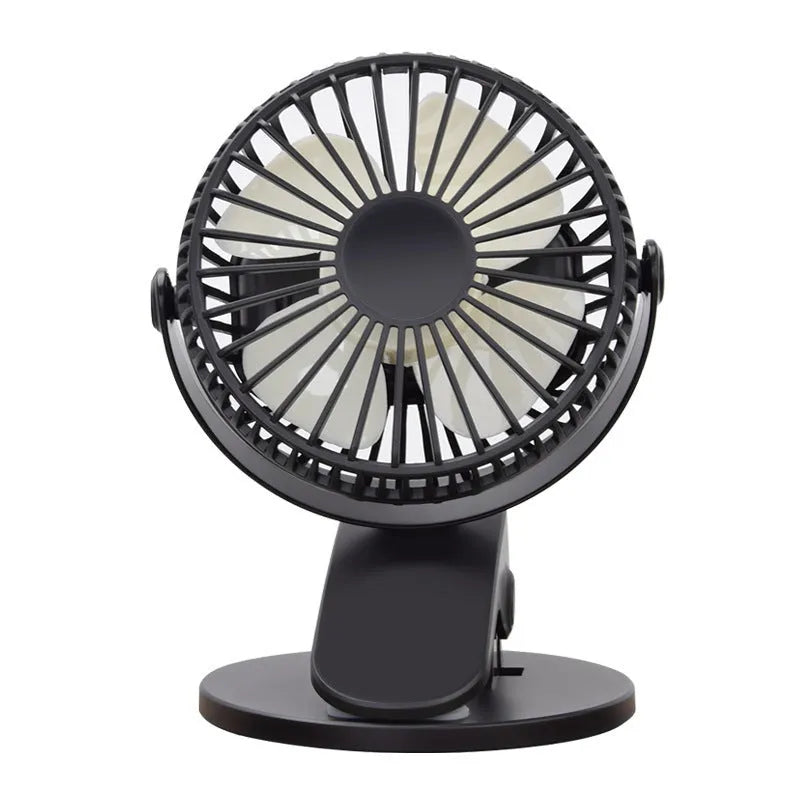 White USB rechargeable clip fan with plastic blades attached to a stroller handle.