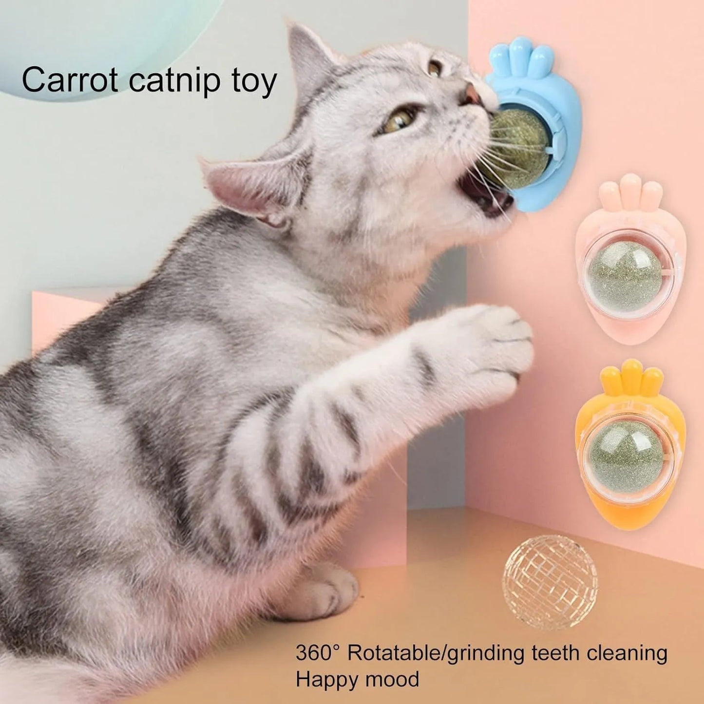 Blue carrot-shaped catnip ball with adhesive sticker mounted on a white wall next to a cat.