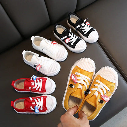 Korean style children's canvas shoes in black, red, yellow or white with non-slip rubber soles
