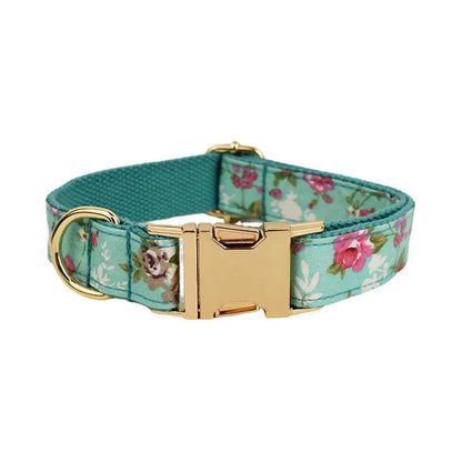 Fabric dog collar and leash set with detachable rose bow in green background