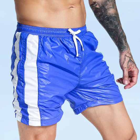 Men's blue sports shorts with lace-up waist and built-in padding for running and sports activities