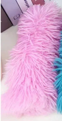 Plush cat toy pillow in blue, green, pink, and white colours measuring 27 by 10 centimetres