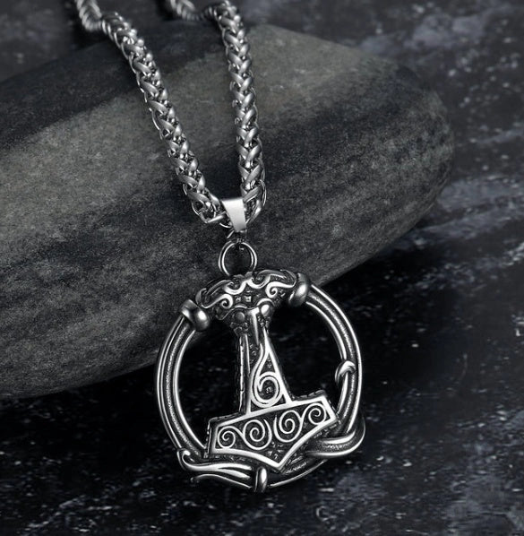 Stainless steel Norse rune necklaces with various Viking symbols and designs