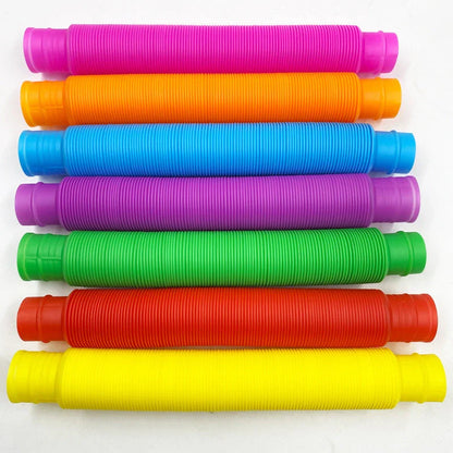 Colorful, flexible sensory fidget tube toy for kids, featuring vibrant colors and customizable shapes to promote creativity and sensory development