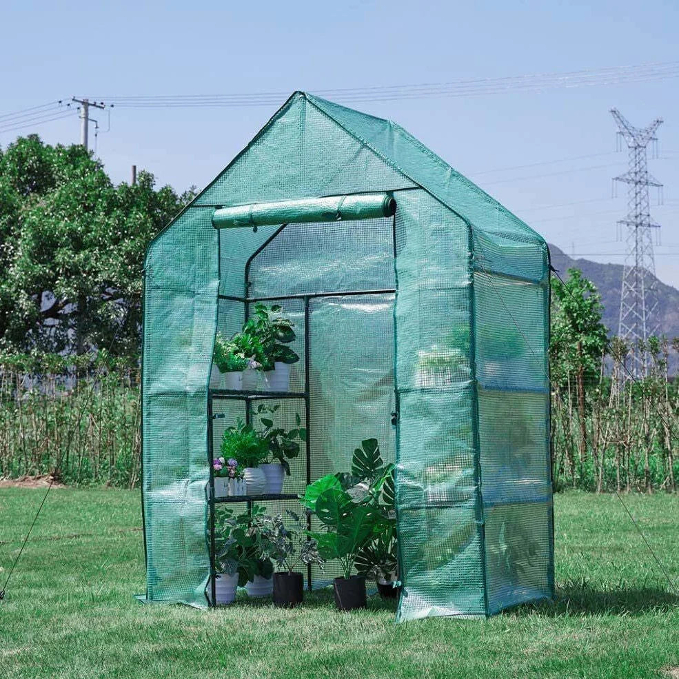 Green PE mesh greenhouse stand with steel frame measuring 143cm long by 73cm wide by 195cm tall