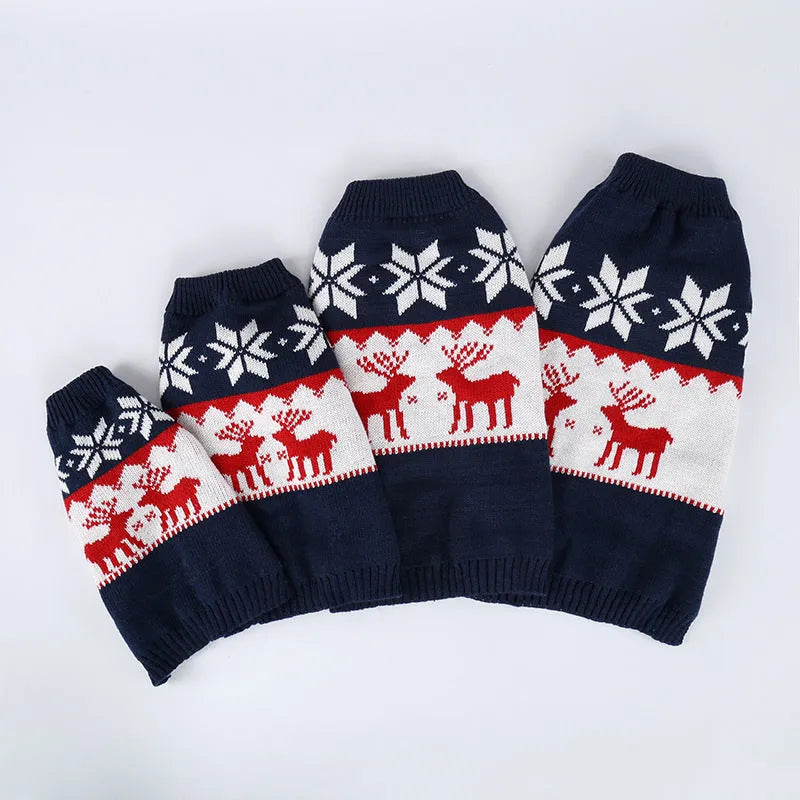 Navy blue knitted Christmas sweater for dogs on a festive background