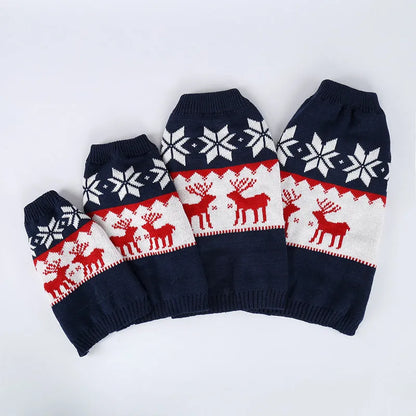 Navy blue knitted Christmas sweater for dogs on a festive background
