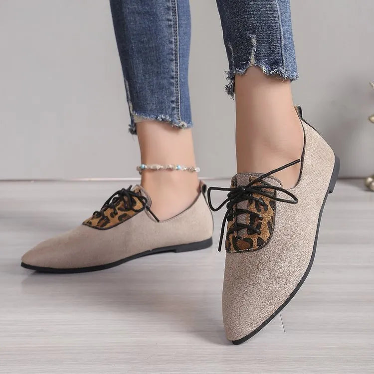 Beige leopard print women's pumps with pointed toe design and rubber sole