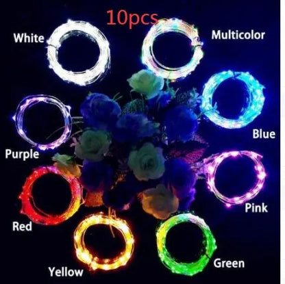 Copper wire LED string light with 20 bulbs wrapped around wine bottle for decorative lighting