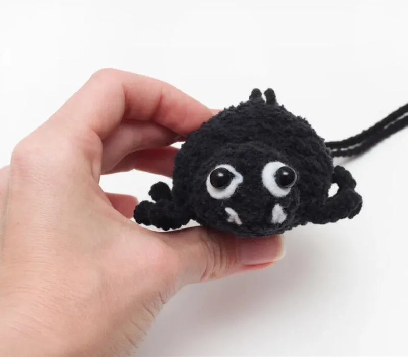 Soft, hand-woven plush car hanging ornament in a cartoon character design.