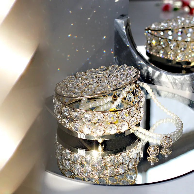 French gold iron jewellery box with crystal glass panels showing jewellery inside