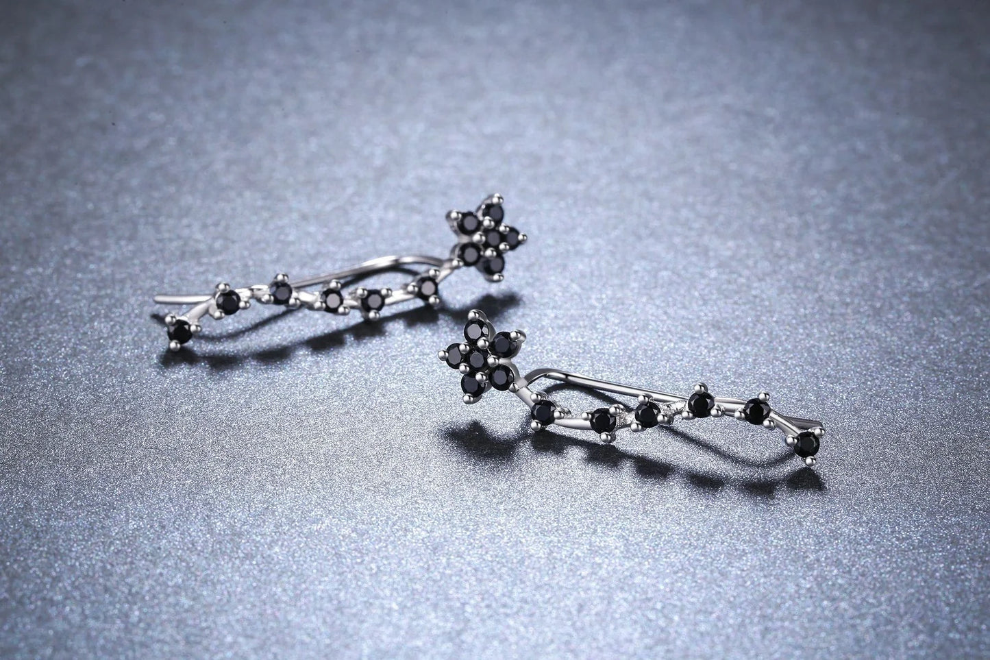 Women's long fringed zircon earrings in black with flower details and secure backing