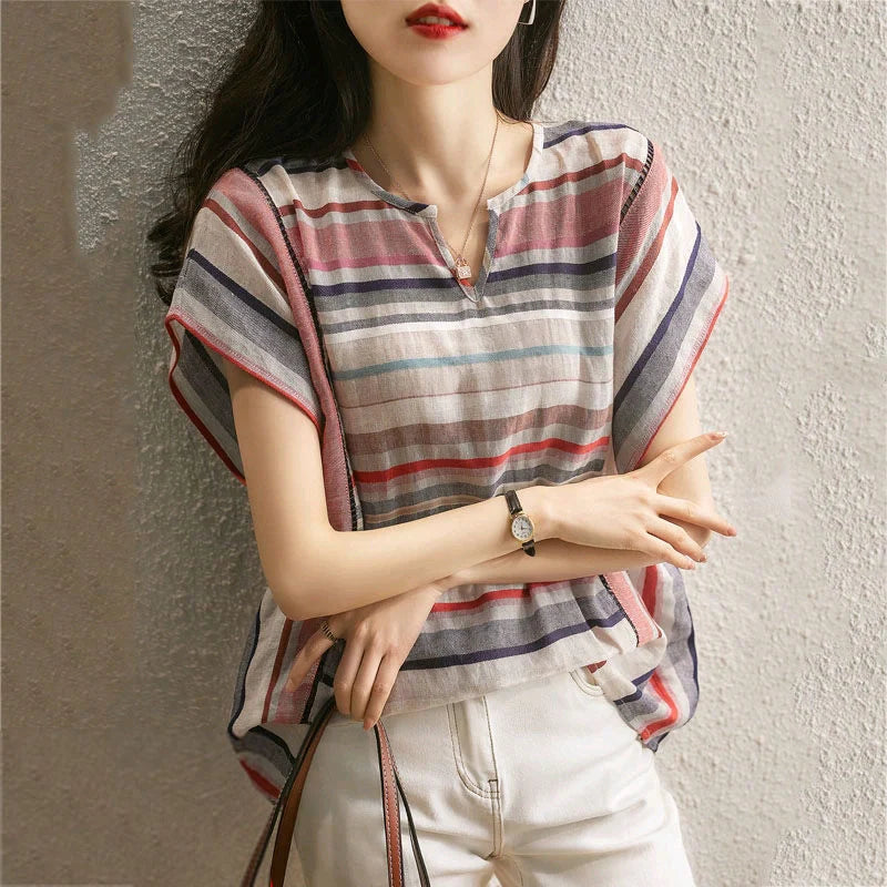 Stylish striped blouse for women with loose, flowy design in variety of sizes