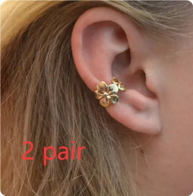 Gold electroplated alloy earrings with starfish and conch design elements for women's beach fashion