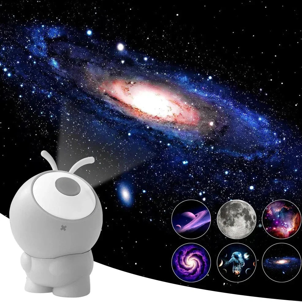 Grey ABS silicone galaxy projector showing rotating star projection on ceiling with USB cable