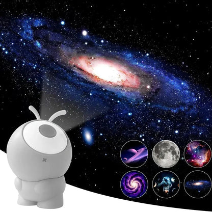 Grey ABS silicone galaxy projector showing rotating star projection on ceiling with USB cable