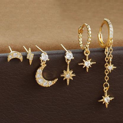 XINGX gold chain tassel earrings set showing six zircon stud earrings with dangling chain elements