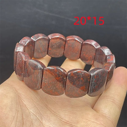Bloodstone meteorite bracelet in quartz rock jade with traditional pendant options on wrist