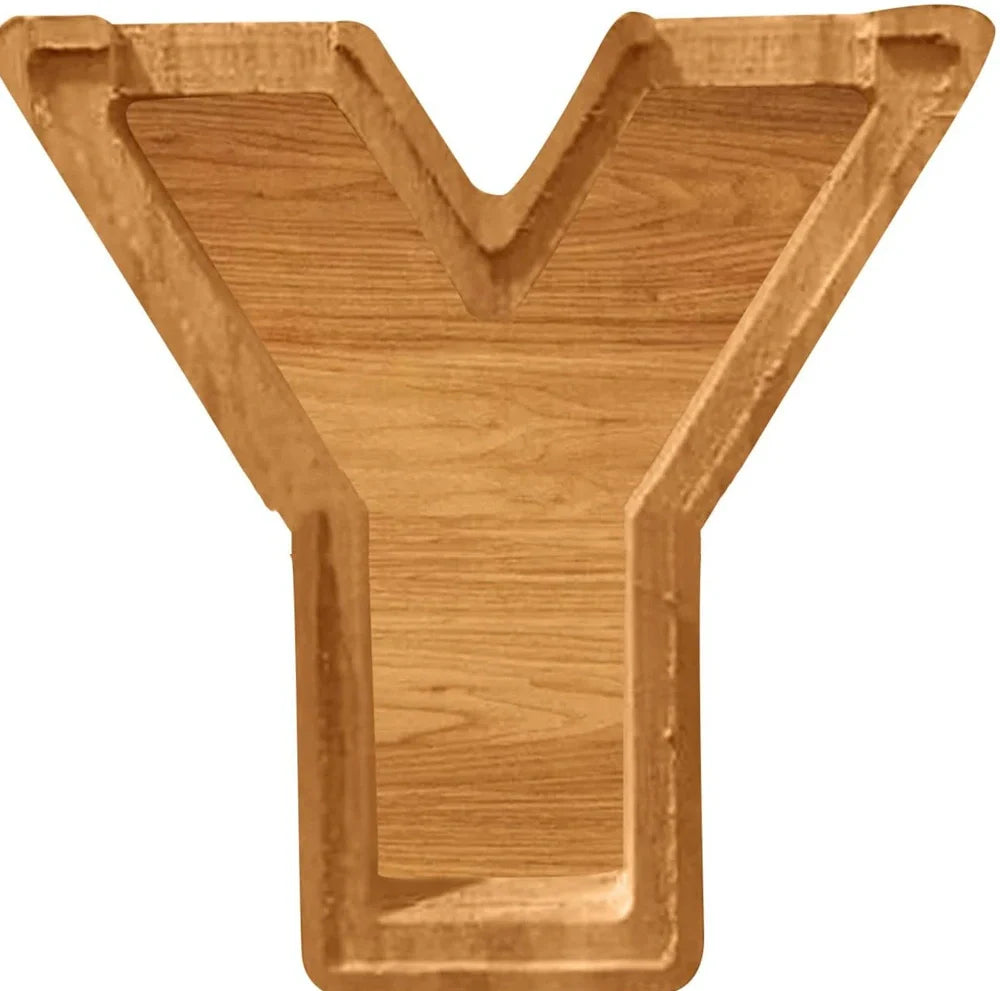 Handmade wooden letter piggy bank with personalised initial, showing 15cm height and 5cm coin slot for UK coins