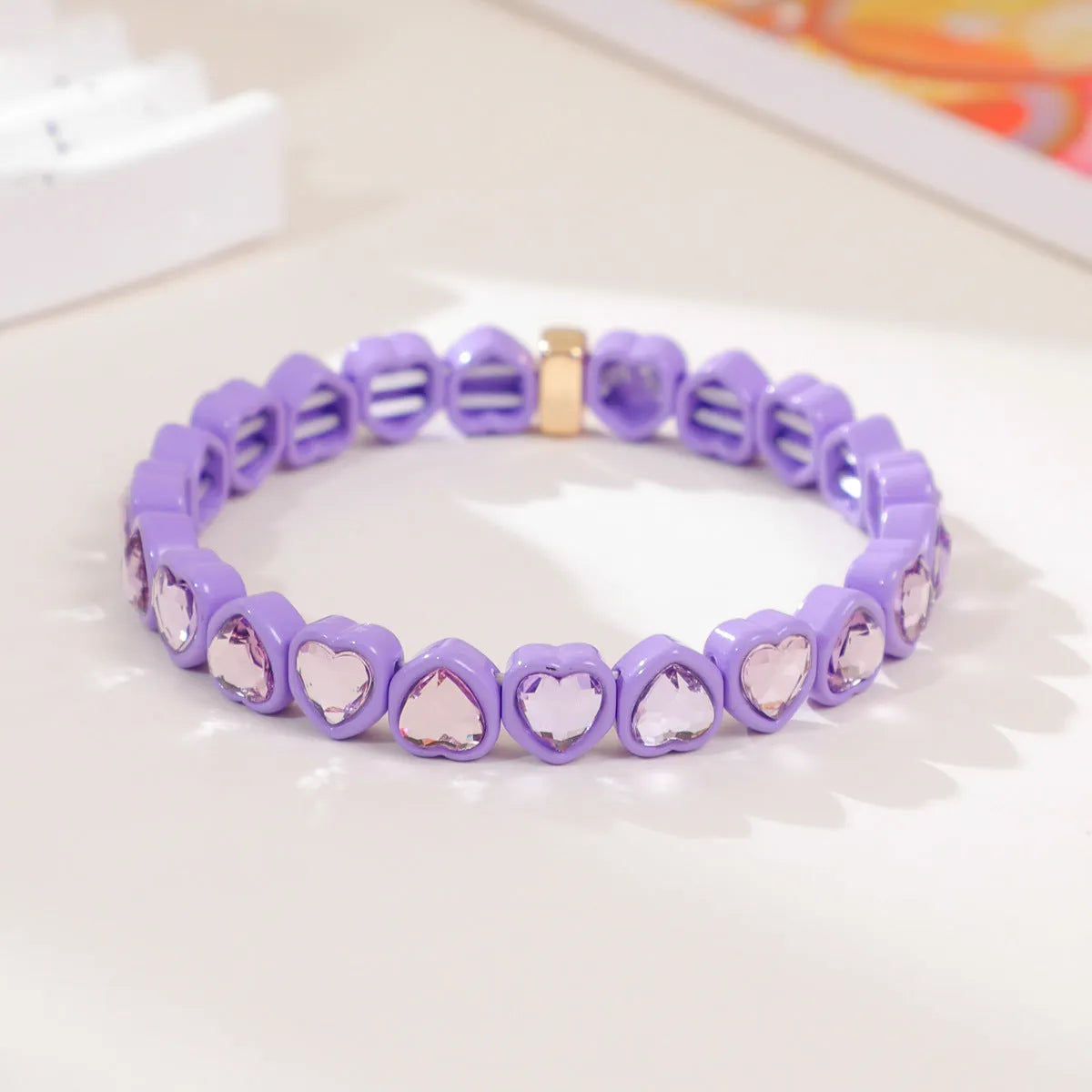 Rainbow enamel heart-shaped stretch bracelet in alloy with diamond process surface
