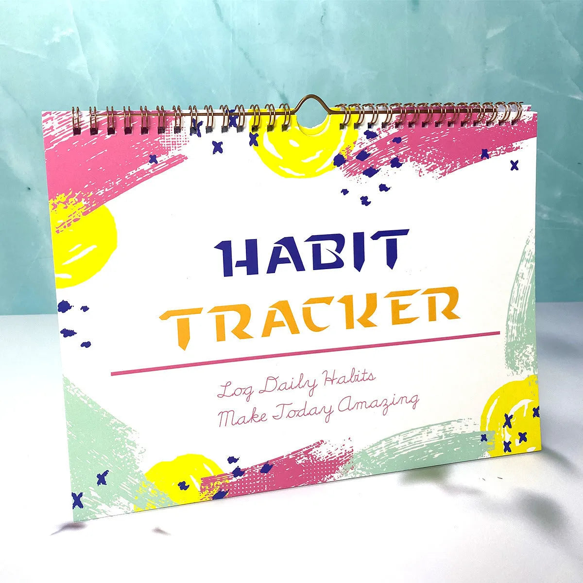 Habit tracking planning book in A4 size with multiple colour options