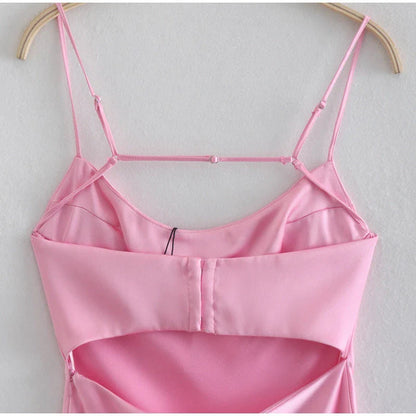 Elegant satin slip dress in pink with a flattering, form-fitting silhouette and sexy backless design