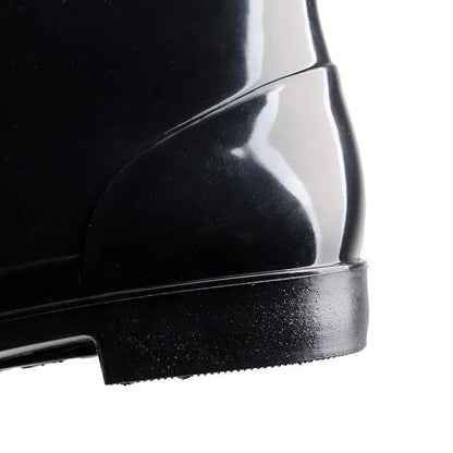 Black short-tube men's rain boots with non-slip plastic sole and PVC upper, sizes 36-50.