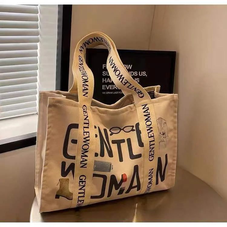 Canvas women's travel tote bag with printed patterns and shoulder straps