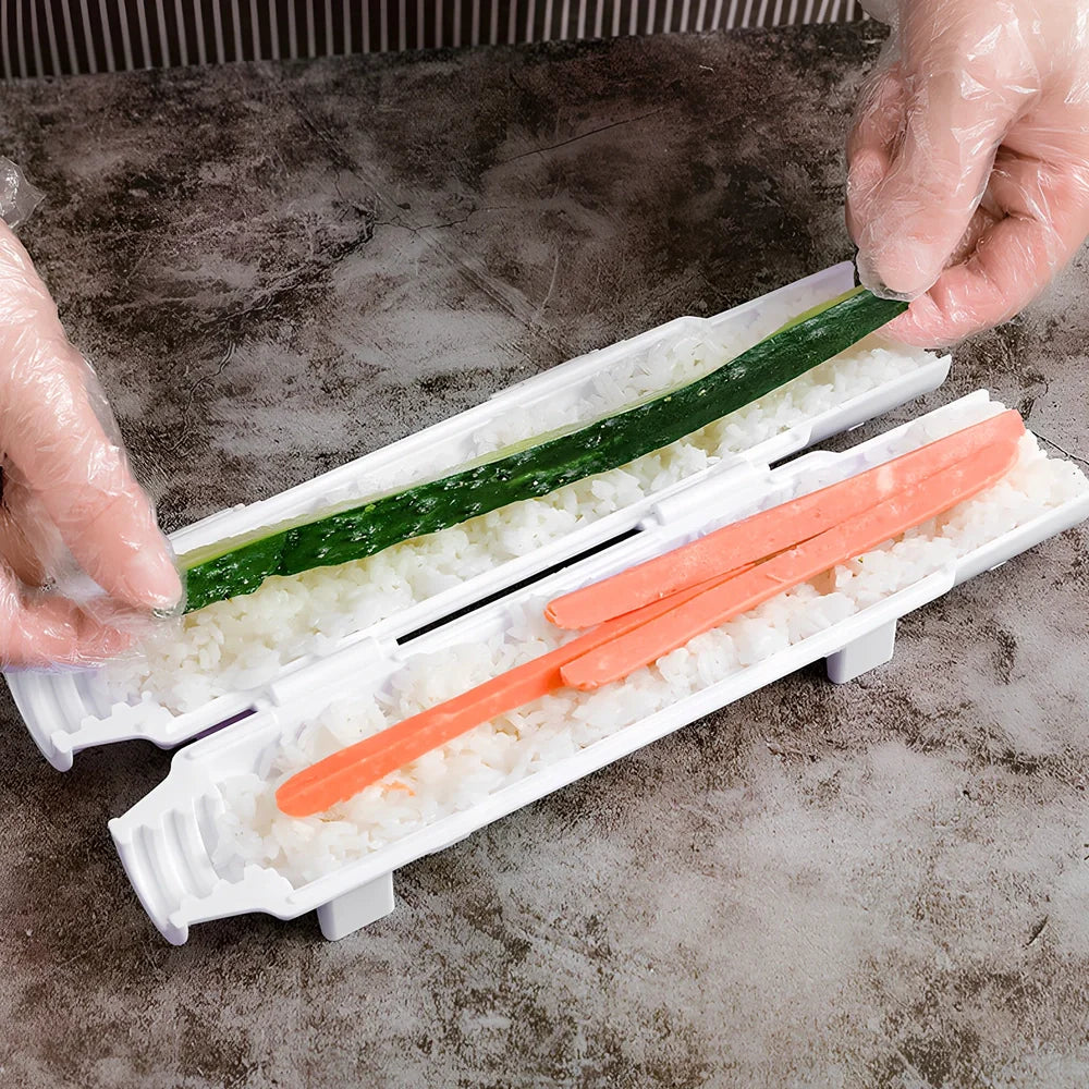 Manual sushi maker tool creating 2.5cm diameter rolls with food-grade plastic construction