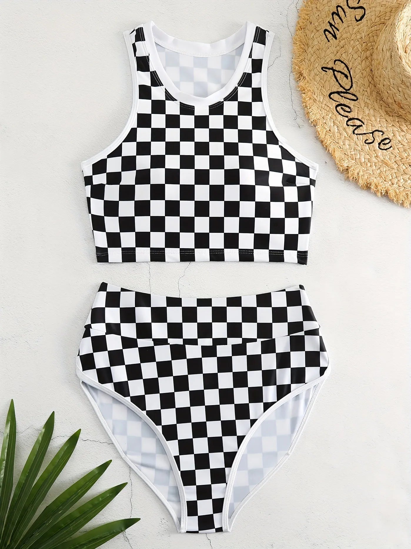 Women's black and white checkerboard print backless racing swimsuit with suspender straps