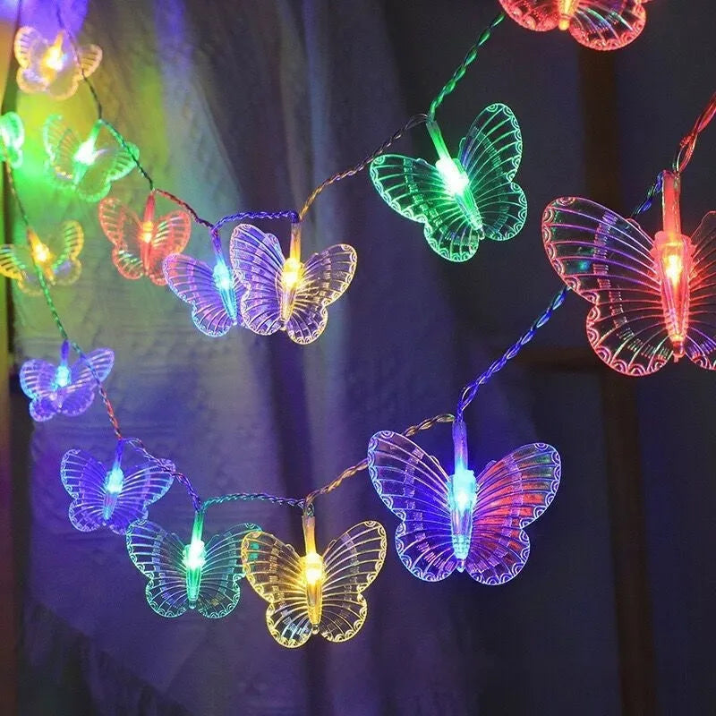 Solar butterfly dragonfly string lights in garden with IP65 protection, multiple lengths and warm or colour light options