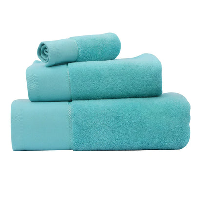 Three-piece cotton towel set showing 70x140cm bath towel, 35x75cm face towel, and 32x32cm square towel with combed yarn texture