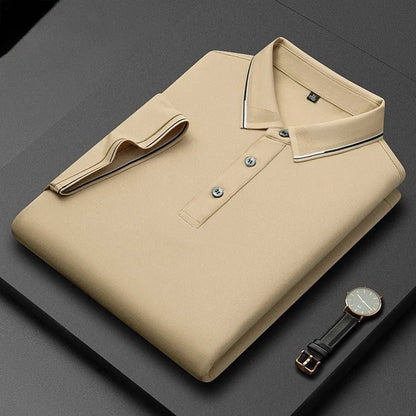 A man's mulberry silk short-sleeved T-shirt in a regular fit, shown in a light colour, highlighting its thin fabric.
