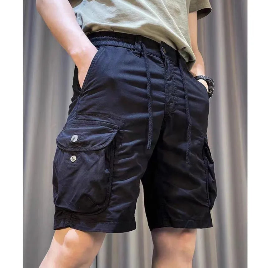 Loose straight multi-pocket casual overalls pants in black, grey, green, or khaki with a relaxed fit and five pockets.