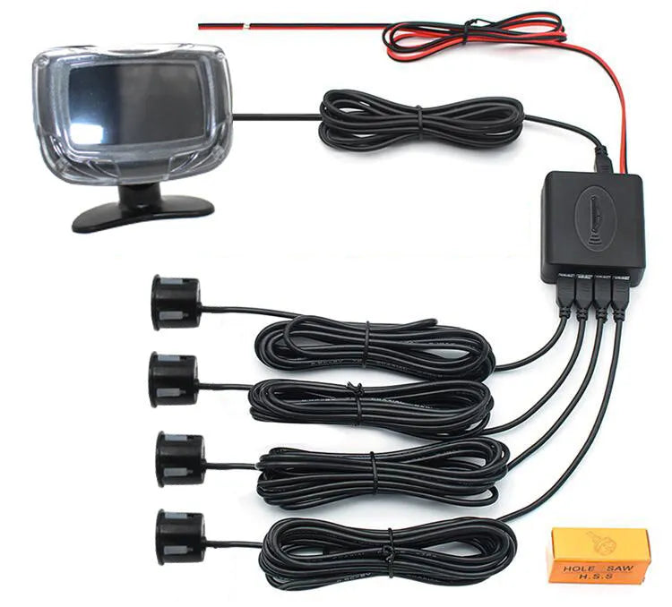 Black wireless vehicle reversing sensor system with LED display unit and four round probes.