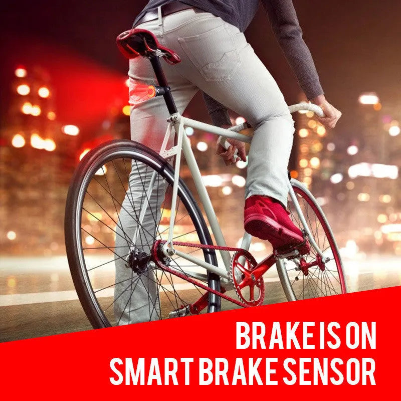 Black aluminium alloy bicycle taillight measuring 35x39x58mm with USB charging port and brake sensing technology