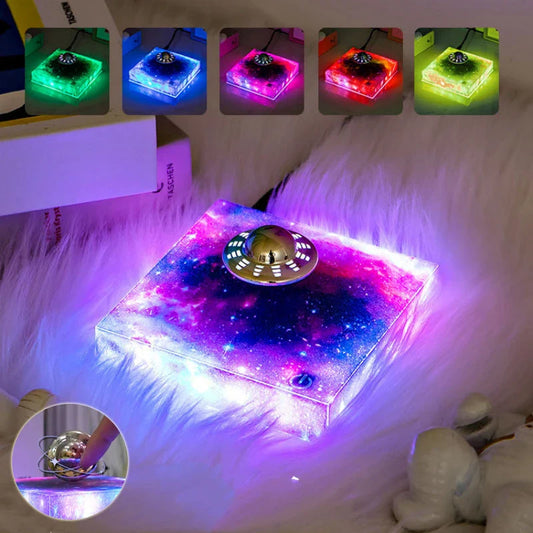 Levitating UFO Galaxy Lamp with color-changing RGB lighting, magnetic suspension, and a glowing galaxy base