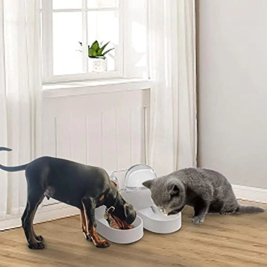 White gravity cat feeder and water dispenser set with wave-shaped design, showing disassembled components