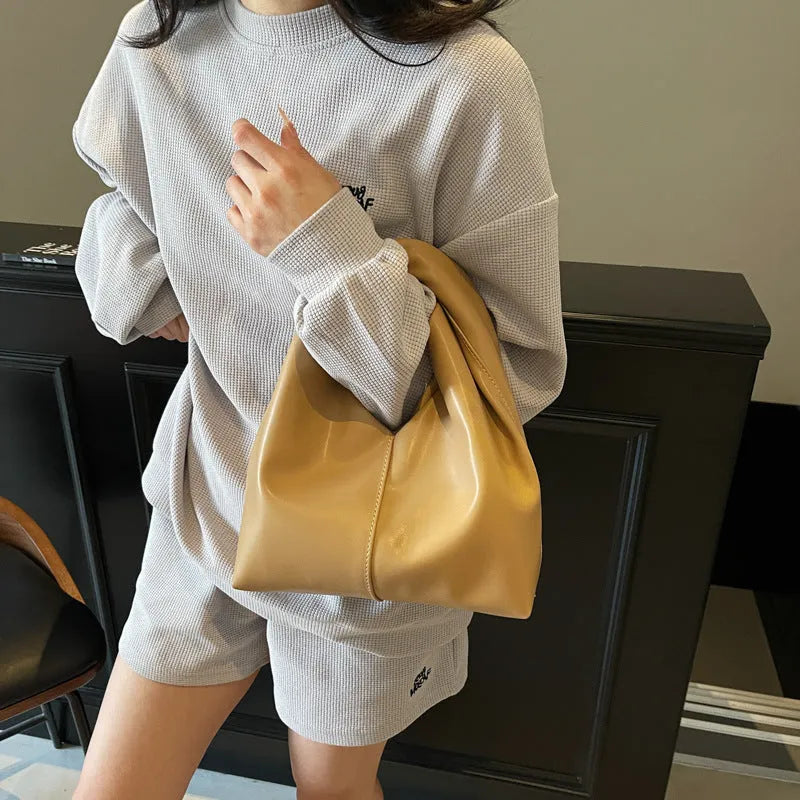 Women's dumpling-shaped casual handbag in PU with folded stitching and sandwich pocket